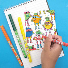 Load image into Gallery viewer, orange, watermelon, blueberry, tangerine, and more super fruit coloring sheet being colored in with washable markers
